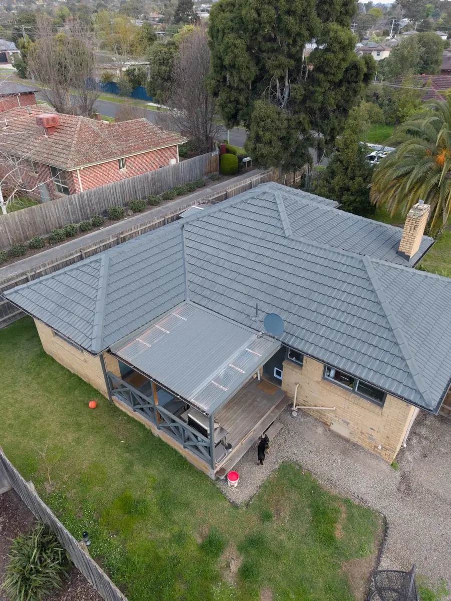 Tile roof on a brick home from the air